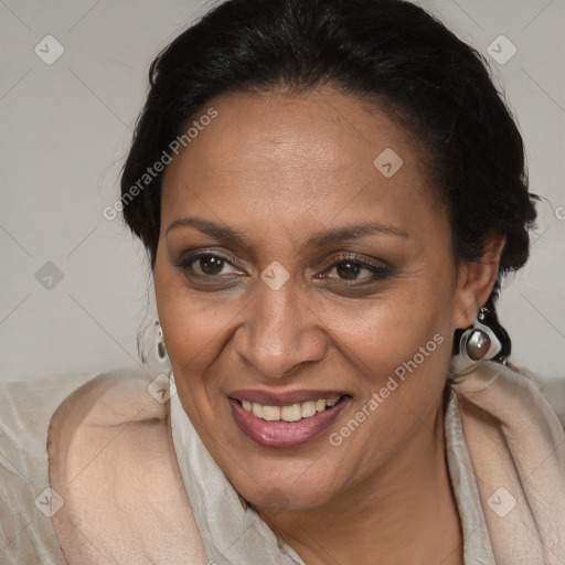 Joyful black adult female with medium  brown hair and brown eyes