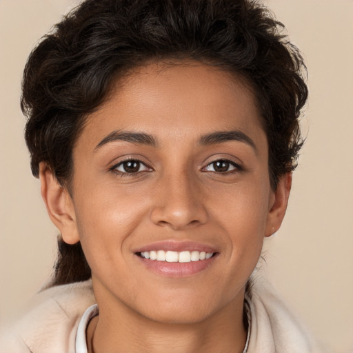 Joyful white young-adult female with short  brown hair and brown eyes