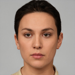 Neutral white young-adult female with short  brown hair and brown eyes