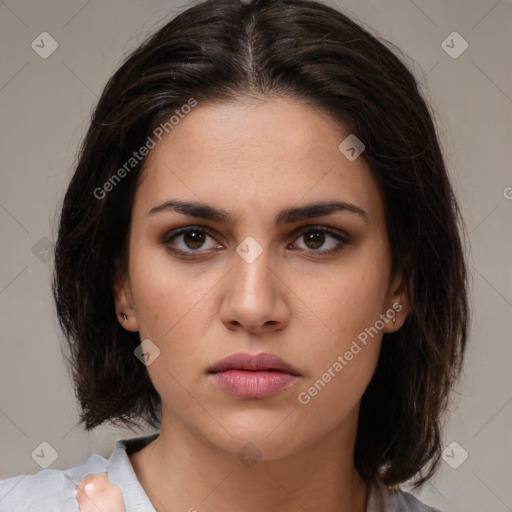 Neutral white young-adult female with medium  brown hair and brown eyes