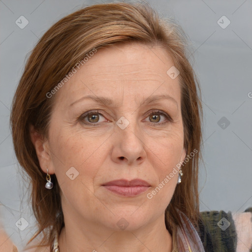 Joyful white adult female with medium  brown hair and brown eyes