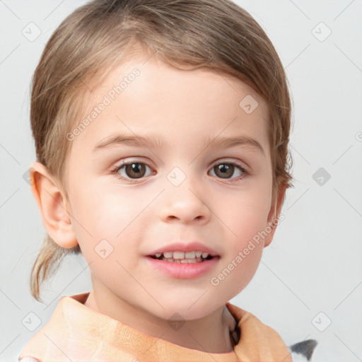 Joyful white child female with short  brown hair and brown eyes