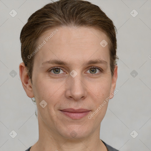 Joyful white young-adult female with short  brown hair and grey eyes