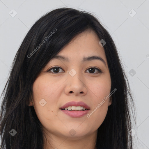 Joyful asian young-adult female with long  brown hair and brown eyes