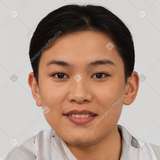 Joyful asian young-adult female with short  black hair and brown eyes