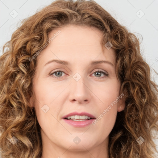 Joyful white young-adult female with long  brown hair and green eyes