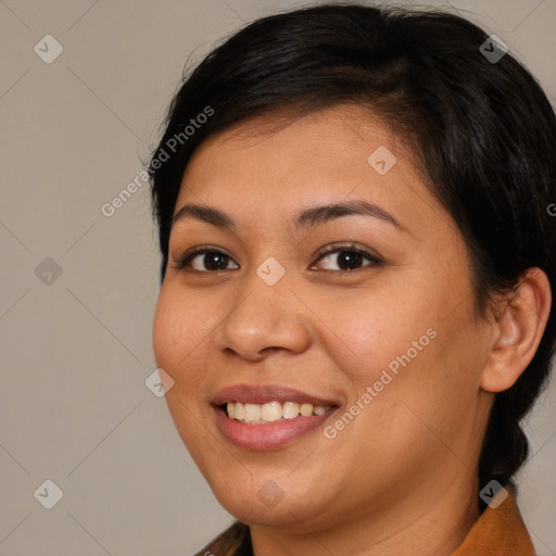 Joyful white young-adult female with medium  brown hair and brown eyes