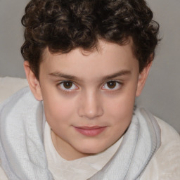 Joyful white child male with short  brown hair and brown eyes