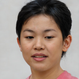 Joyful asian young-adult female with short  brown hair and brown eyes