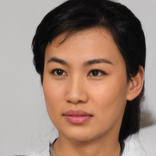 Neutral asian young-adult female with medium  black hair and brown eyes