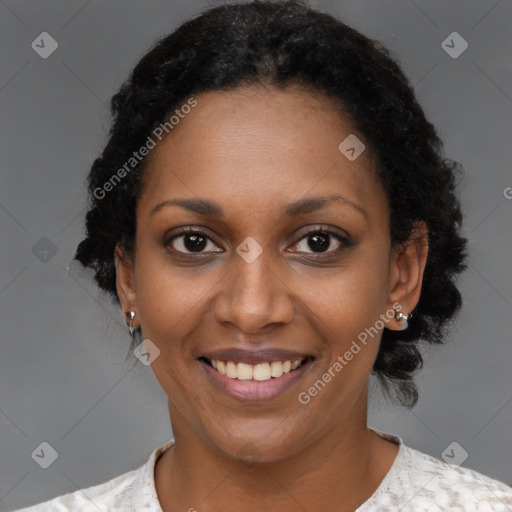 Joyful black young-adult female with medium  black hair and brown eyes