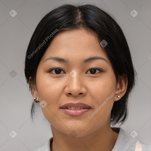 Joyful asian young-adult female with medium  black hair and brown eyes