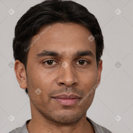 Neutral latino adult male with short  brown hair and brown eyes