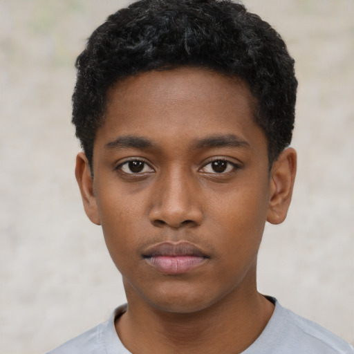 Neutral black child male with short  black hair and brown eyes