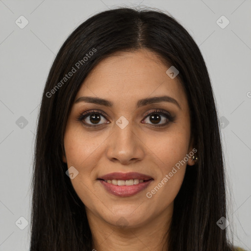 Joyful latino young-adult female with long  brown hair and brown eyes