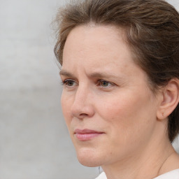 Neutral white adult female with medium  brown hair and brown eyes