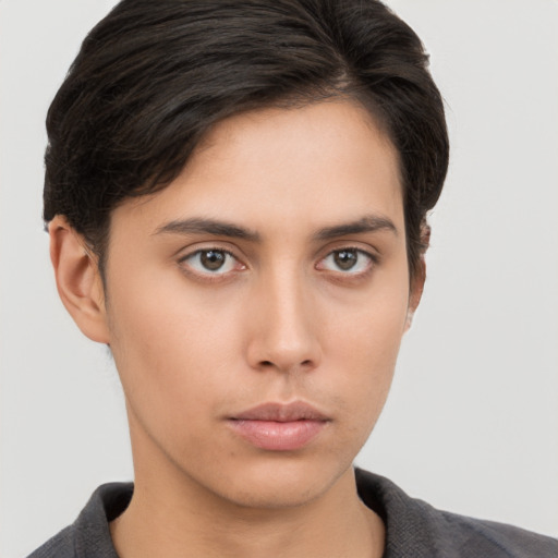 Neutral asian young-adult male with short  brown hair and brown eyes