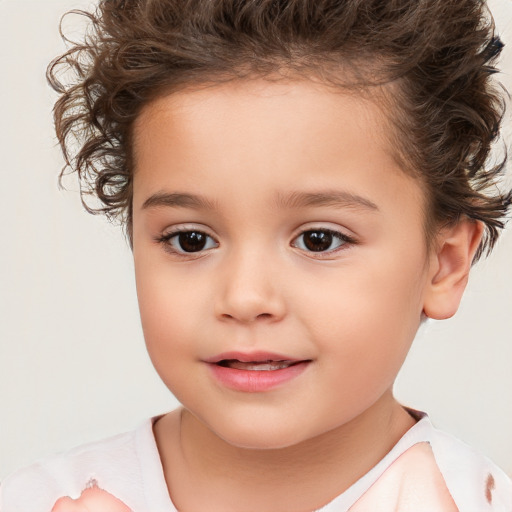 Joyful white child female with short  brown hair and brown eyes