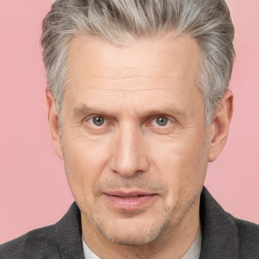 Joyful white middle-aged male with short  brown hair and brown eyes