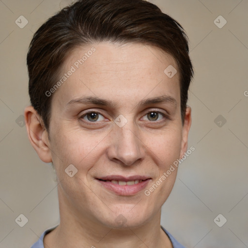 Joyful white adult female with short  brown hair and grey eyes