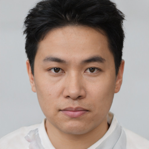 Neutral asian young-adult male with short  brown hair and brown eyes
