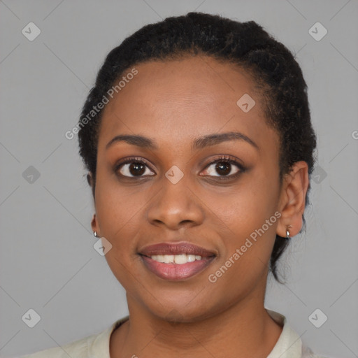 Joyful latino young-adult female with short  black hair and brown eyes