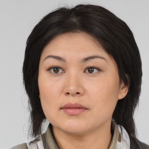 Neutral asian young-adult female with medium  black hair and brown eyes