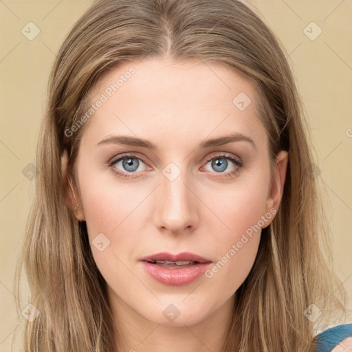 Joyful white young-adult female with long  brown hair and blue eyes