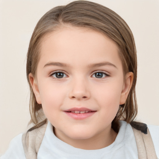 Joyful white child female with medium  brown hair and grey eyes