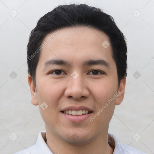 Joyful asian young-adult male with short  black hair and brown eyes