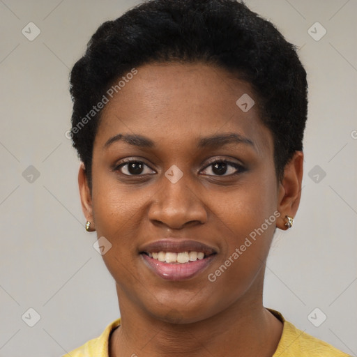 Joyful black young-adult female with short  black hair and brown eyes