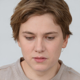 Neutral white young-adult female with short  brown hair and brown eyes