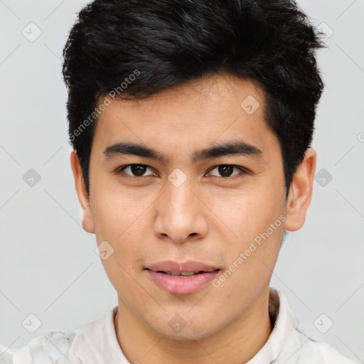 Joyful asian young-adult male with short  brown hair and brown eyes