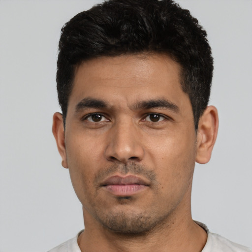 Neutral white young-adult male with short  black hair and brown eyes