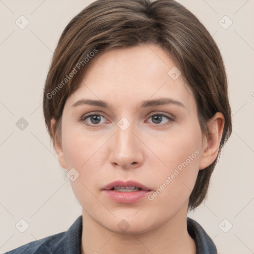 Neutral white young-adult female with medium  brown hair and grey eyes