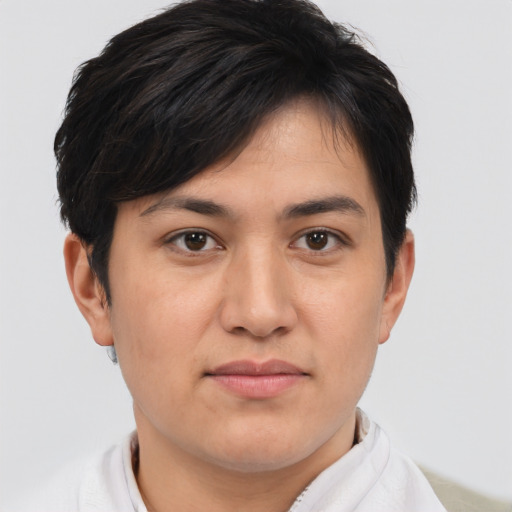 Joyful asian young-adult female with short  brown hair and brown eyes