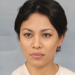 Neutral asian young-adult female with medium  brown hair and brown eyes