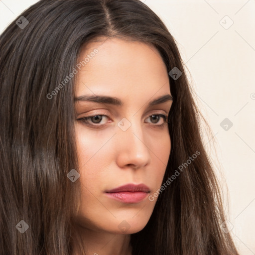 Neutral white young-adult female with long  brown hair and brown eyes