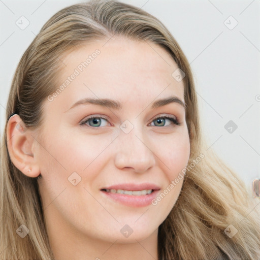 Joyful white young-adult female with long  brown hair and blue eyes