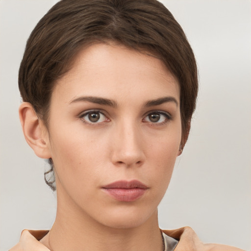 Neutral white young-adult female with short  brown hair and brown eyes