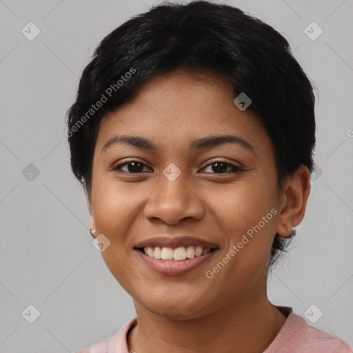 Joyful latino young-adult female with short  black hair and brown eyes