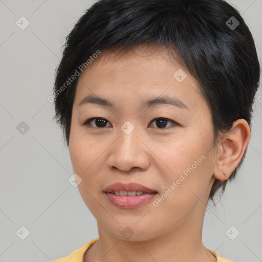 Joyful asian young-adult female with short  brown hair and brown eyes