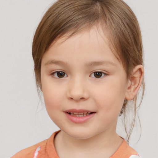 Joyful white child female with medium  brown hair and brown eyes