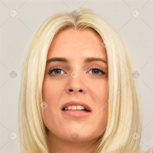 Joyful white young-adult female with long  brown hair and blue eyes