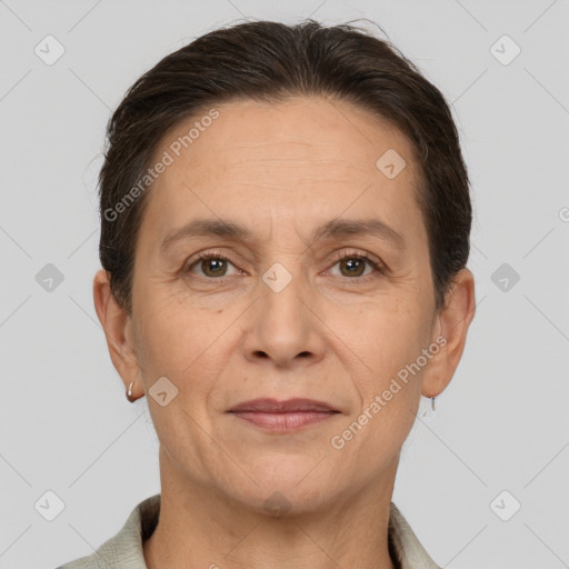 Joyful white adult female with short  brown hair and brown eyes