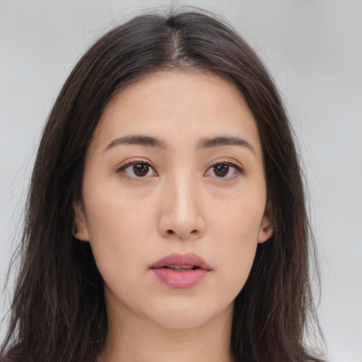 Neutral asian young-adult female with long  brown hair and brown eyes