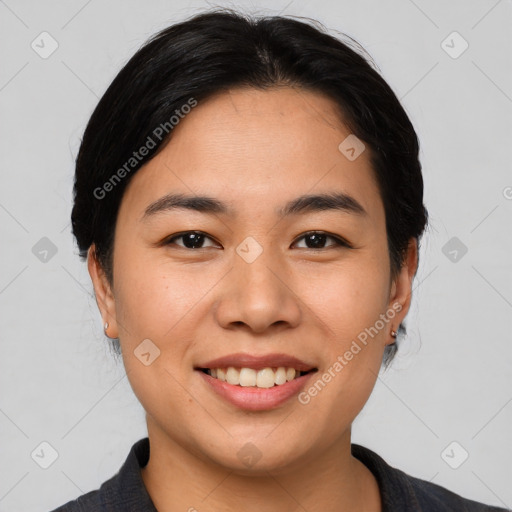 Joyful asian young-adult female with medium  black hair and brown eyes