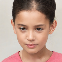 Joyful white child female with short  brown hair and brown eyes