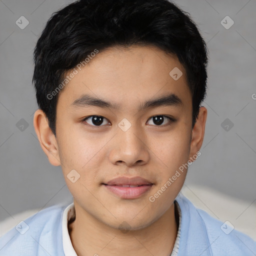 Joyful asian young-adult male with short  black hair and brown eyes