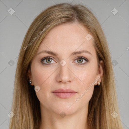 Joyful white young-adult female with long  brown hair and brown eyes